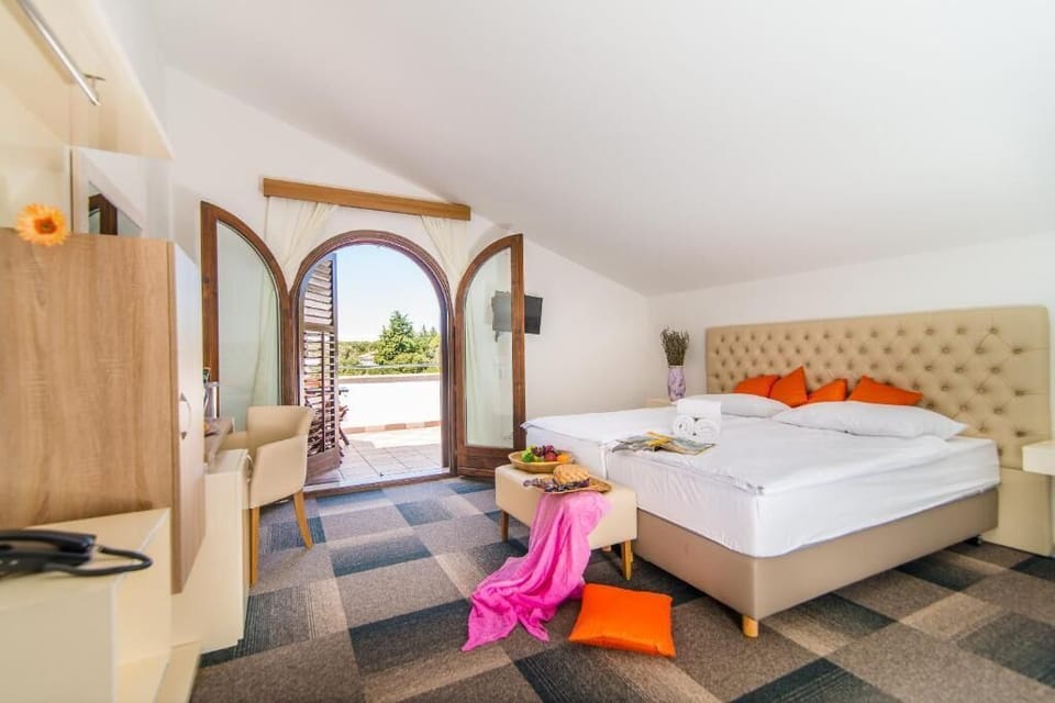 Quadruple Room, Balcony, Sea View | In-room safe, desk, blackout drapes, free WiFi