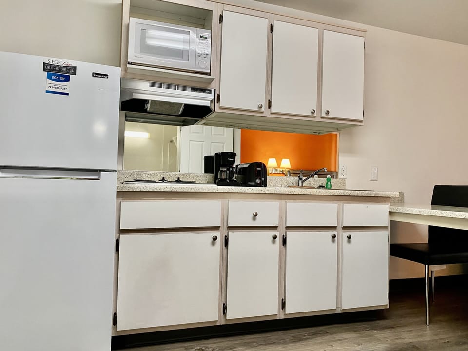 Full-size fridge, microwave, stovetop, toaster