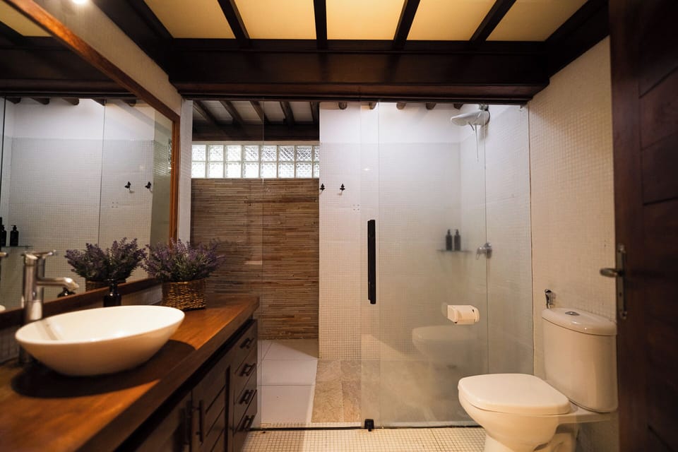Family Room, 3 Bedrooms, Garden Area | Bathroom | Shower, free toiletries, hair dryer, towels