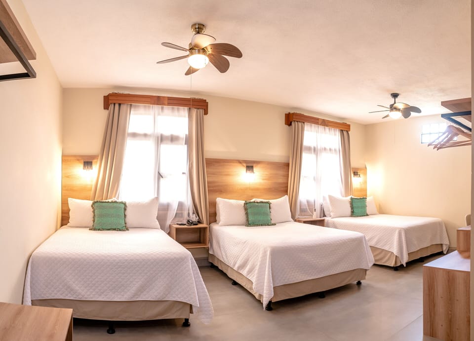Standard Triple Room | Premium bedding, Tempur-Pedic beds, minibar, in-room safe