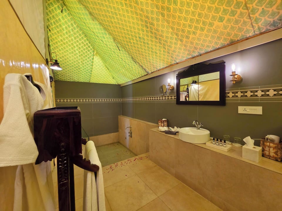 Luxury Suite, Garden View | Bathroom | Separate tub and shower, hair dryer, towels, soap