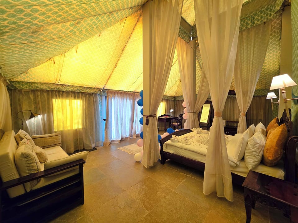Luxury Suite, Garden View | 1 bedroom, in-room safe, desk, laptop workspace