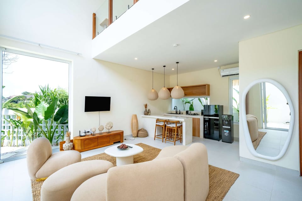 Deluxe Villa, Patio, Pool View | Living area | 42-inch flat-screen TV with cable channels