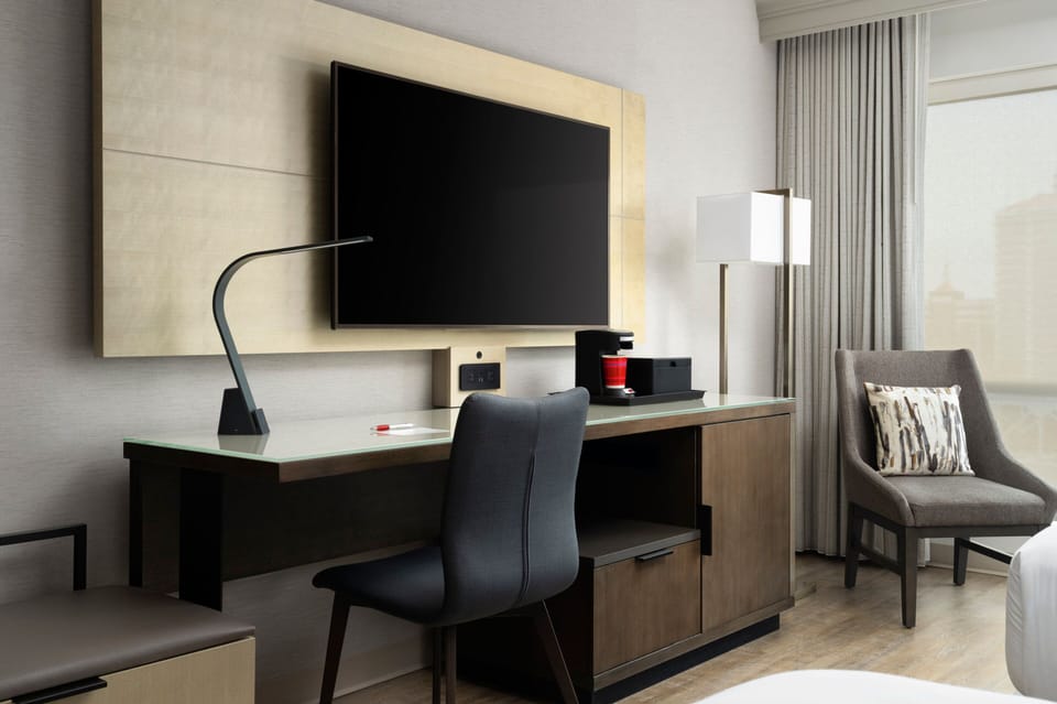 Premium bedding, down comforters, pillowtop beds, in-room safe