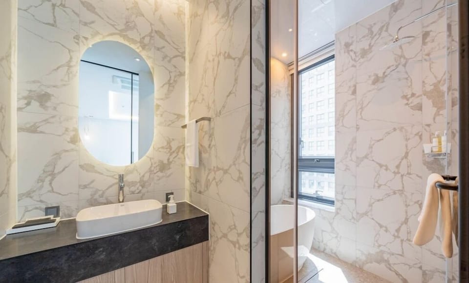 Family Room | Bathroom | Hair dryer, slippers, bidet, towels