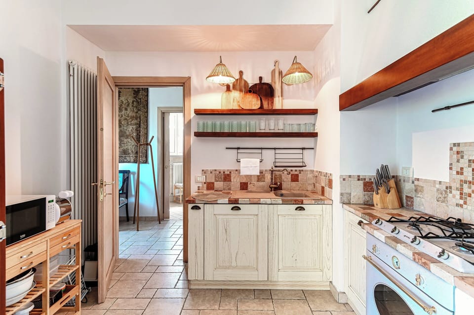 Condo, Balcony, Lake View | Private kitchen | Full-size fridge, microwave, oven, stovetop
