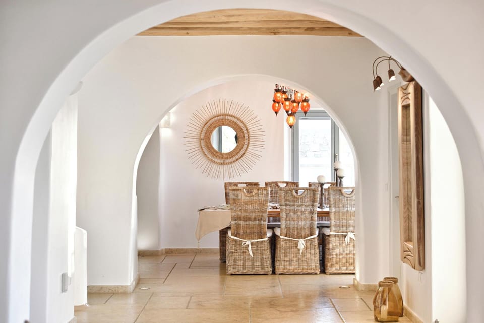 Gran Kanalia Villa Mykonos | Living area | 45-inch flat-screen TV with satellite channels, fireplace