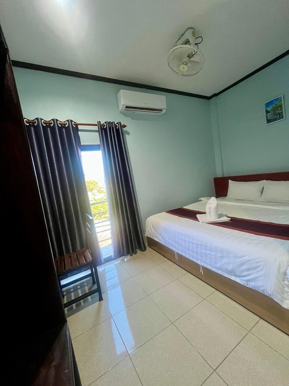Deluxe Double Room, Balcony, City View | Desk, laptop workspace
