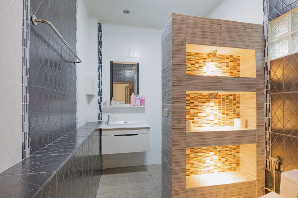 Family Room, 1 King Bed with Sofa bed, Non Smoking, Pool View | Bathroom | Shower, free toiletries, hair dryer, towels