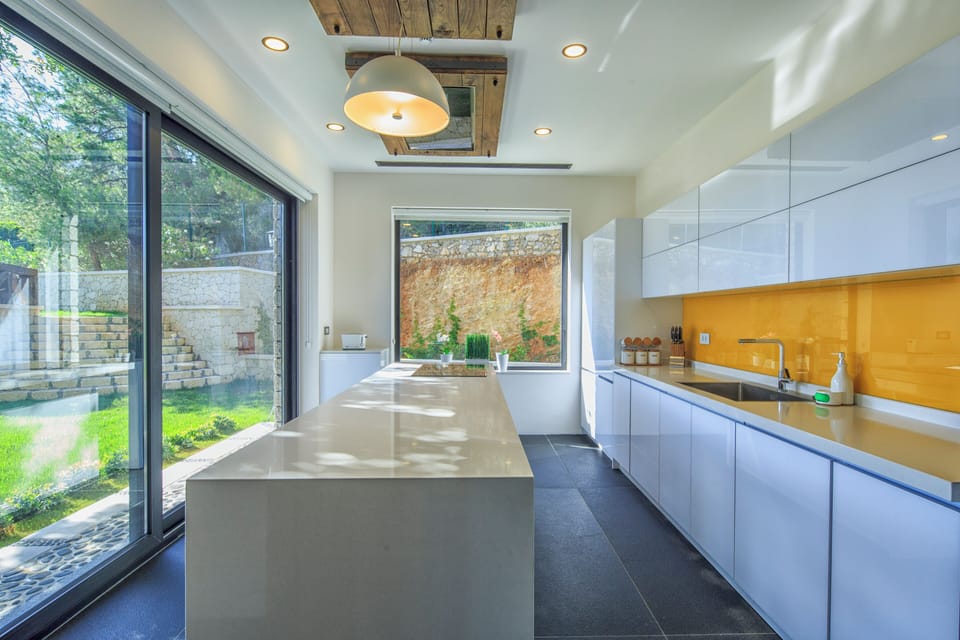 Luxury Villa, Sea View, Beachfront | Private kitchen | Coffee/tea maker, full-size fridge, microwave, oven