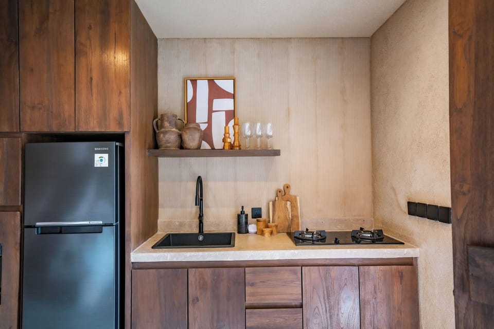 Junior Villa, Patio, Pool View | Private kitchen | Fridge, stovetop, coffee/tea maker, blender