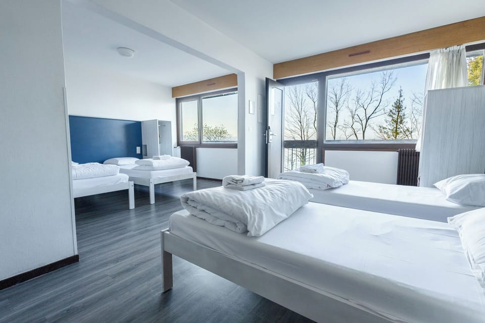 Economy Quadruple Room | Free cribs/infant beds, bed sheets