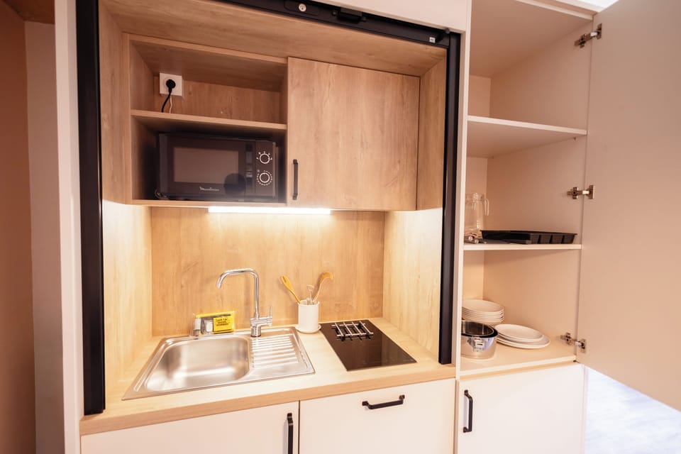 Family Studio, Lake View | Private kitchen | Highchair