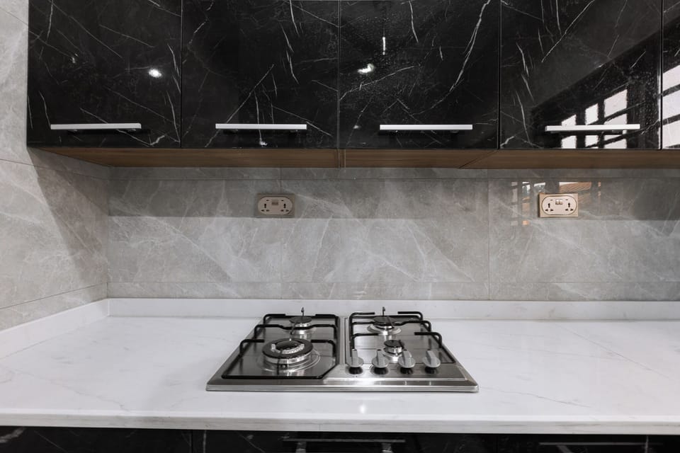 Deluxe Suite, Multiple Beds, City View | Private kitchen