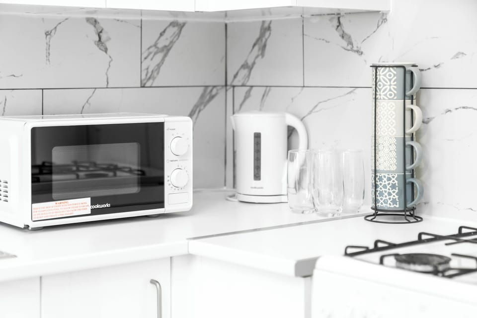 Apartment | Private kitchen | Fridge, microwave, oven, stovetop