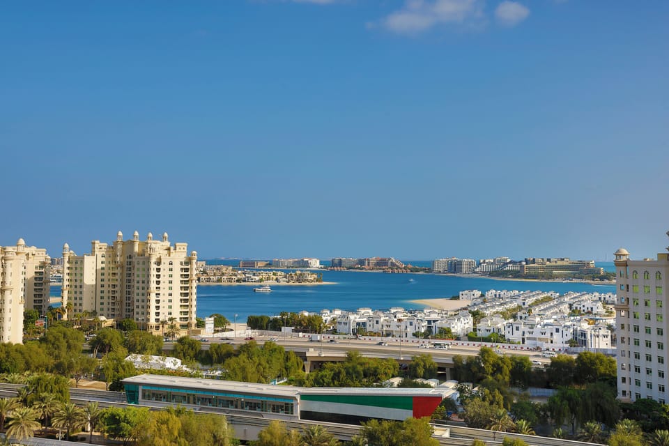 Deluxe Room, 2 Twin Beds, Sea View | Free minibar, in-room safe, desk, laptop workspace
