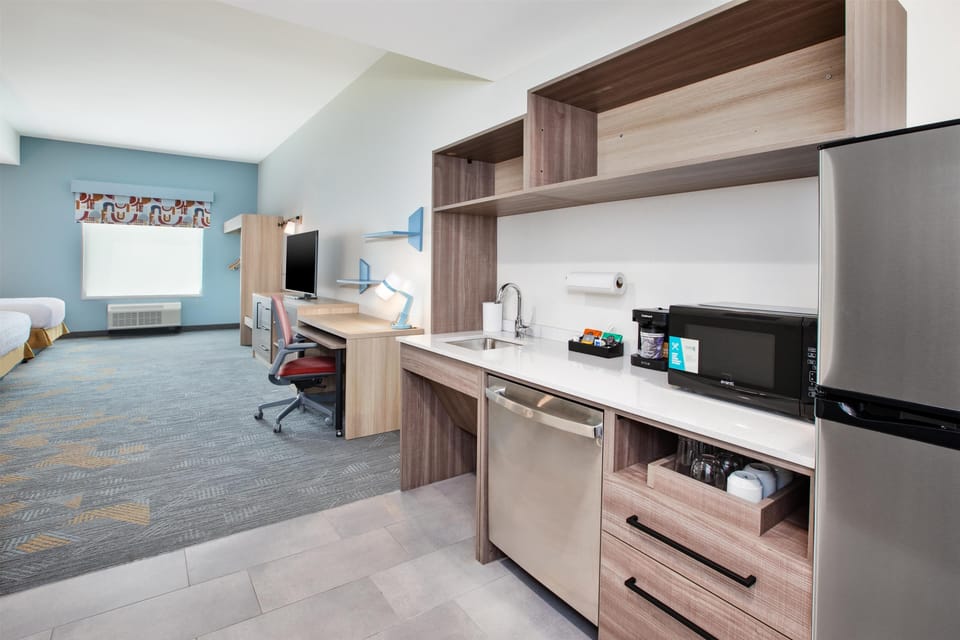 Studio, 2 Queen Beds, Roll-in Shower (Mobility & Hearing) | Desk, laptop workspace, blackout drapes, iron/ironing board