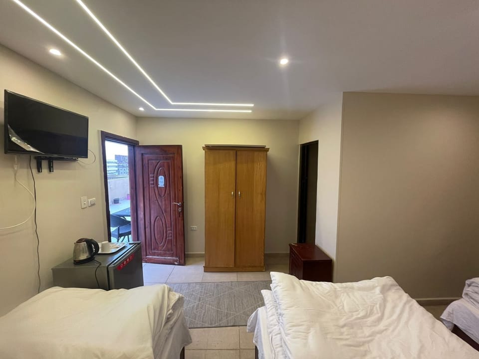Superior Triple Room, City View | Laptop workspace, soundproofing, iron/ironing board, free WiFi