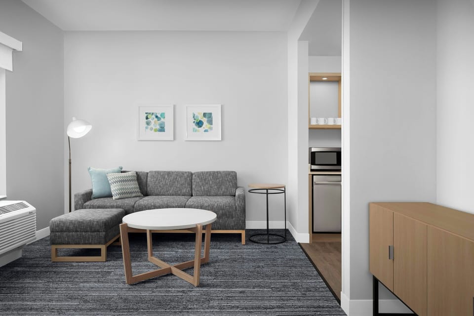 Suite, 1 Bedroom | Desk, blackout drapes, iron/ironing board, free cribs/infant beds