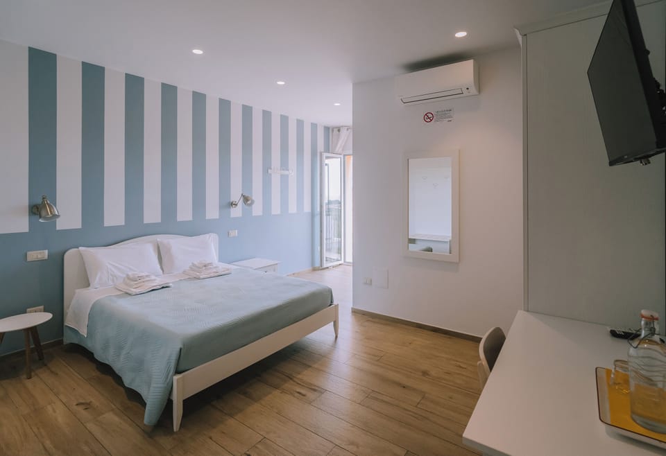 Double Room, Sea View | Desk, laptop workspace, blackout drapes, soundproofing