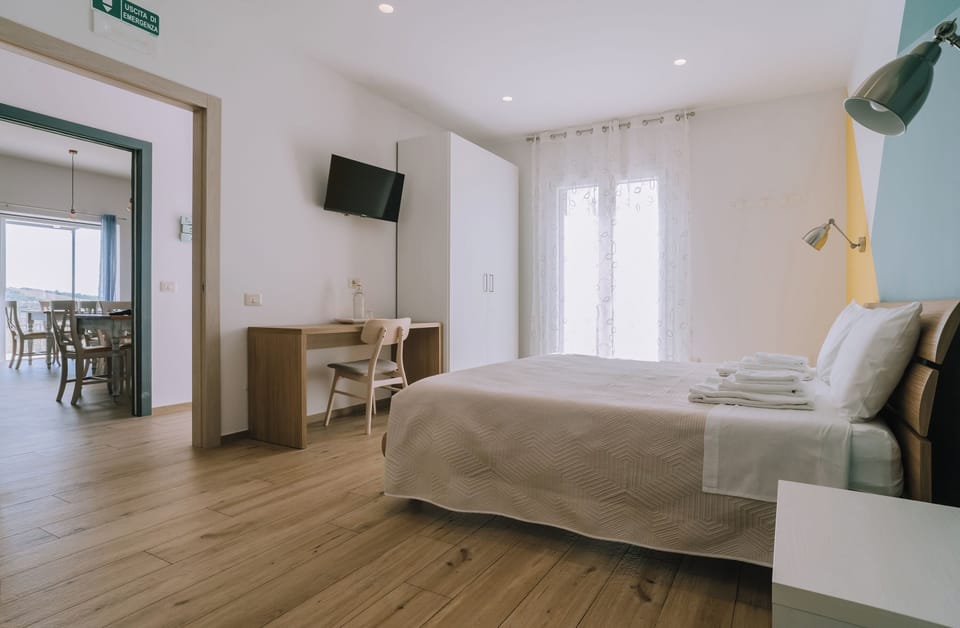 Double Room, Sea View | Desk, laptop workspace, blackout drapes, soundproofing