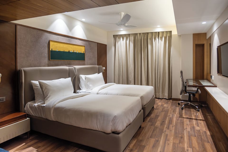Standard Twin Room, Non Smoking | Free minibar items, in-room safe, blackout drapes, soundproofing