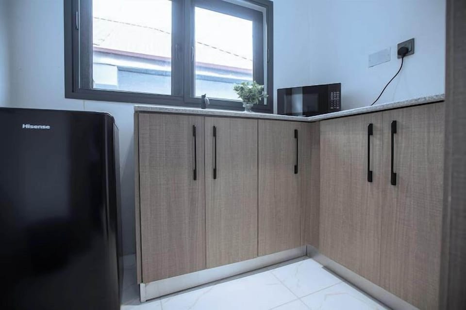 Economy Room, Balcony, City View | Private kitchen | Mini-fridge