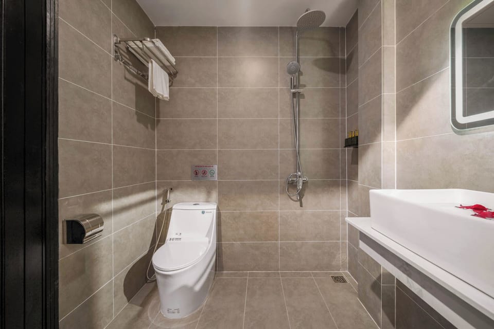 Double Room Single Use | Bathroom | Hair dryer, slippers, towels, soap
