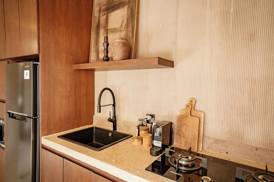 Junior Villa, Patio, Pool View | Private kitchen | Coffee/tea maker, cleaning supplies, freezer, dining tables