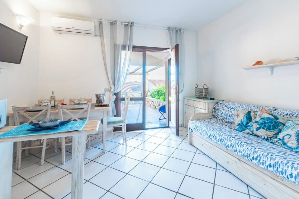Family Apartment, 1 Bedroom, Microwave (Sandy Bear Guesthouse) | Living area | Flat-screen TV