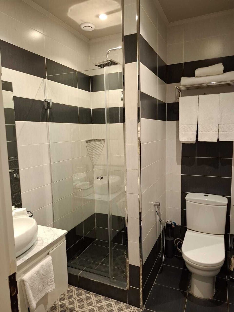 Economy Double or Twin Room | Bathroom | Shower, hair dryer, slippers, towels