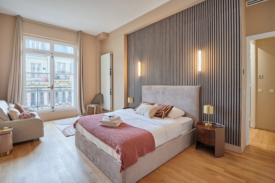 Apartment | Laptop workspace, iron/ironing board, bed sheets