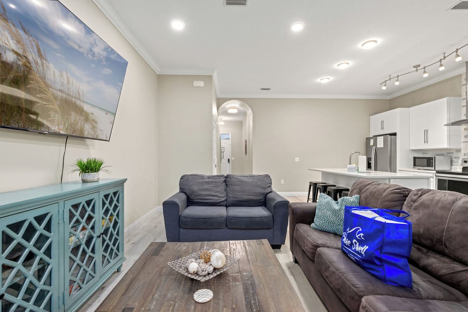 Luxury House, Multiple Beds, Pool Access, Pool View (3919 Ocean View Dr Unit C) | Living area | 65-inch flat-screen TV with digital channels