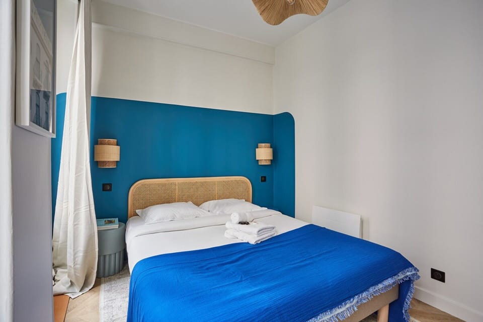 Apartment | Laptop workspace, iron/ironing board, bed sheets