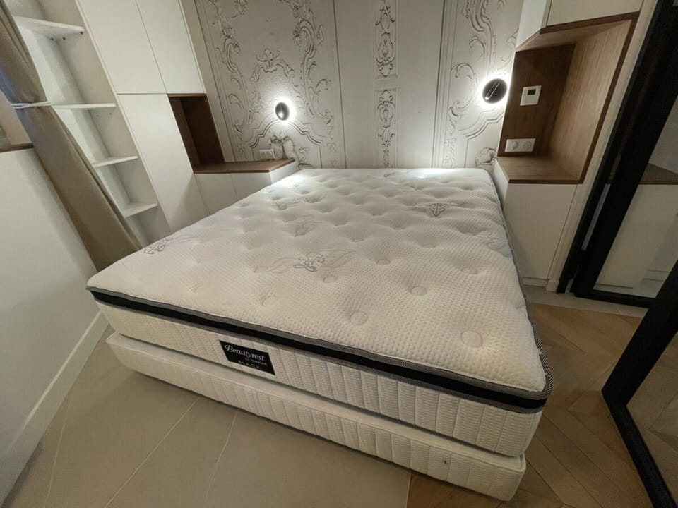 Apartment | Laptop workspace, iron/ironing board, bed sheets