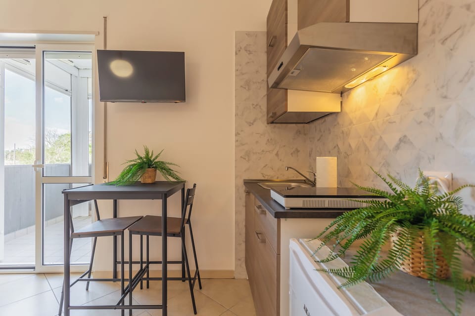 Triple Room, Balcony | In-room dining