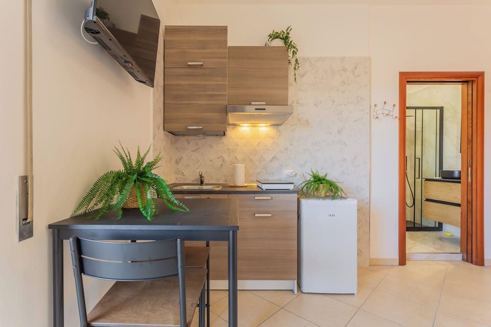 Triple Room, Balcony | In-room dining
