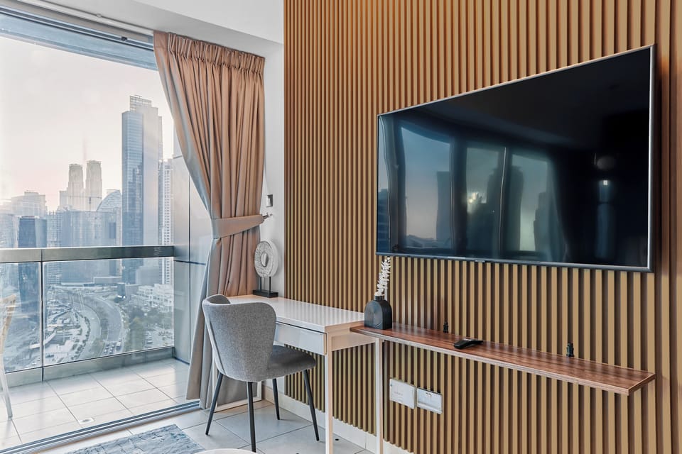 Premium Studio, 1 King Bed, City View | In-room safe, desk, laptop workspace, blackout drapes