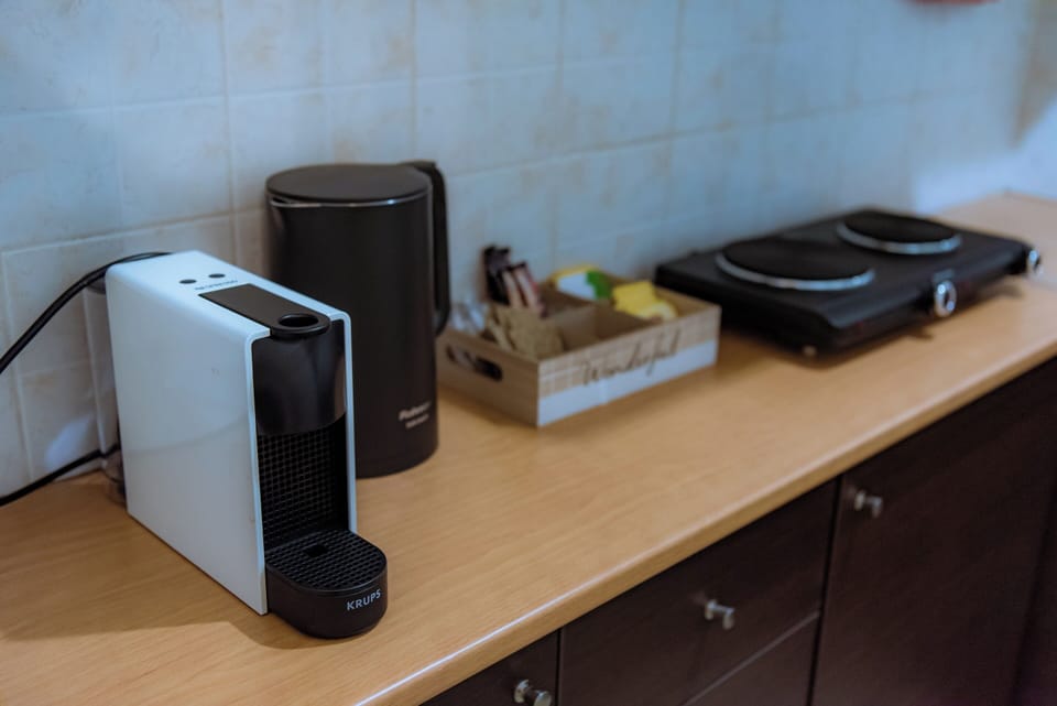 Apartment | Private kitchen | Full-size fridge, stovetop, espresso maker, coffee/tea maker