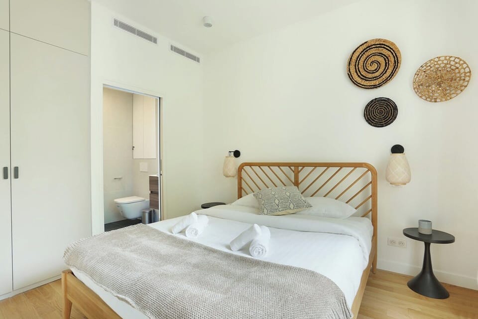 Apartment | Laptop workspace, iron/ironing board, bed sheets