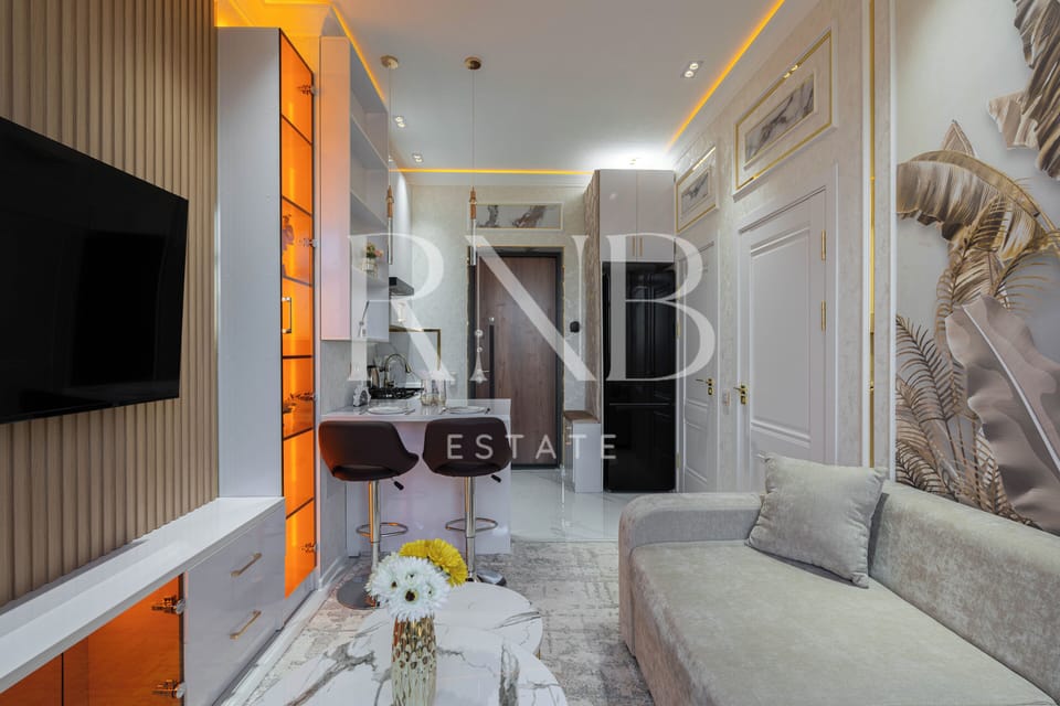 Comfort Condo, Balcony, City View | Living area | 42-inch plasma TV with digital channels