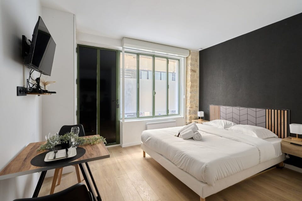 Apartment | Laptop workspace, iron/ironing board, bed sheets