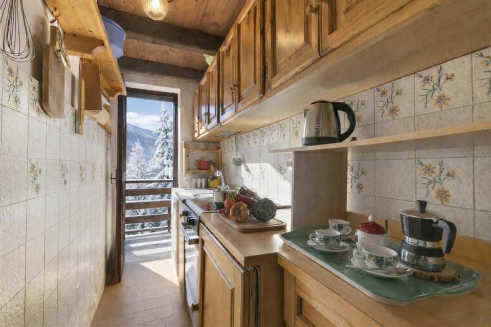 Standard Apartment, Multiple Bedrooms (Appartamento Beau Soleil) | Private kitchen | Fridge, oven, stovetop, dishwasher