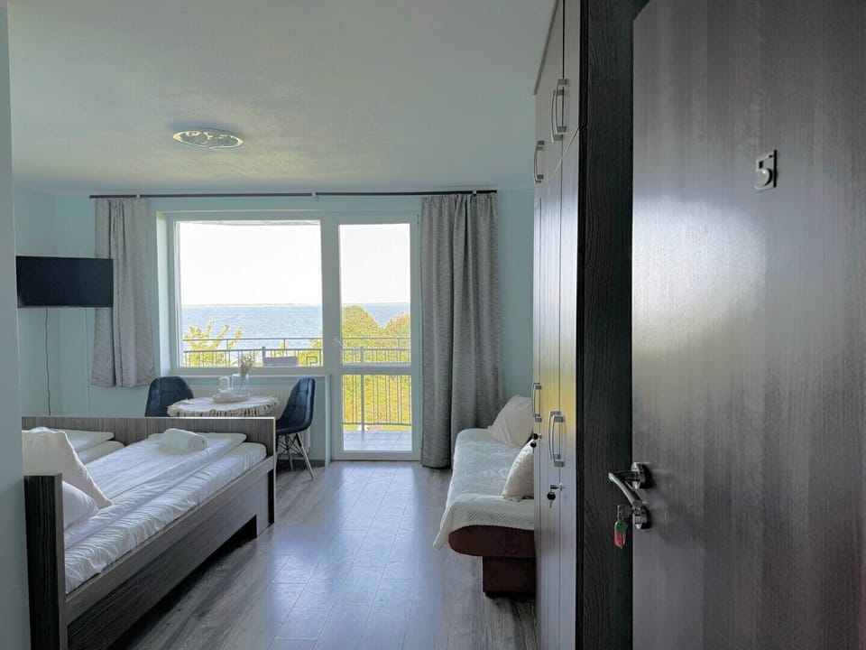 Basic Triple Room, Balcony, Bay View | Free WiFi
