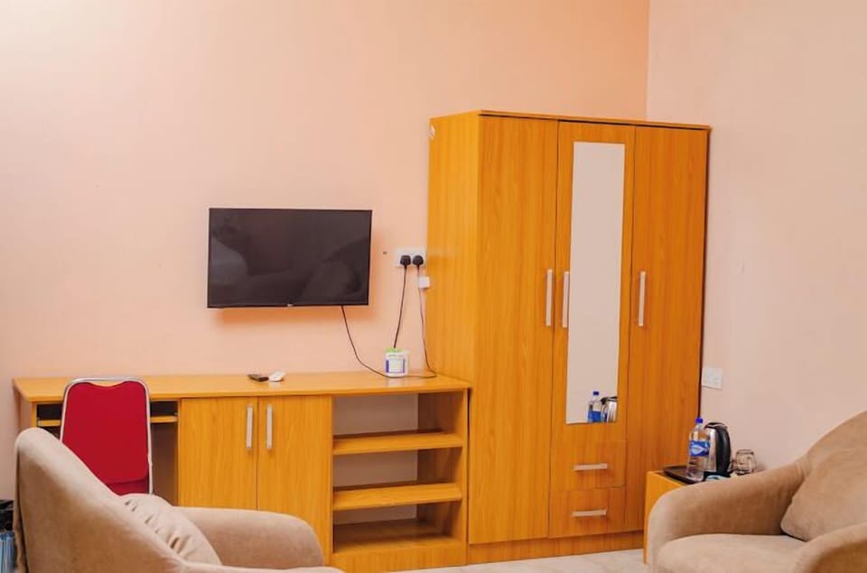 Deluxe Room, Balcony, City View | Desk, laptop workspace, free WiFi