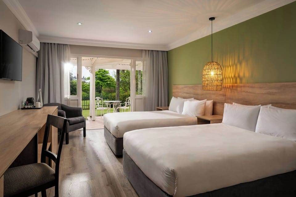 Room, 2 Double Beds | In-room safe, desk, laptop workspace, free WiFi