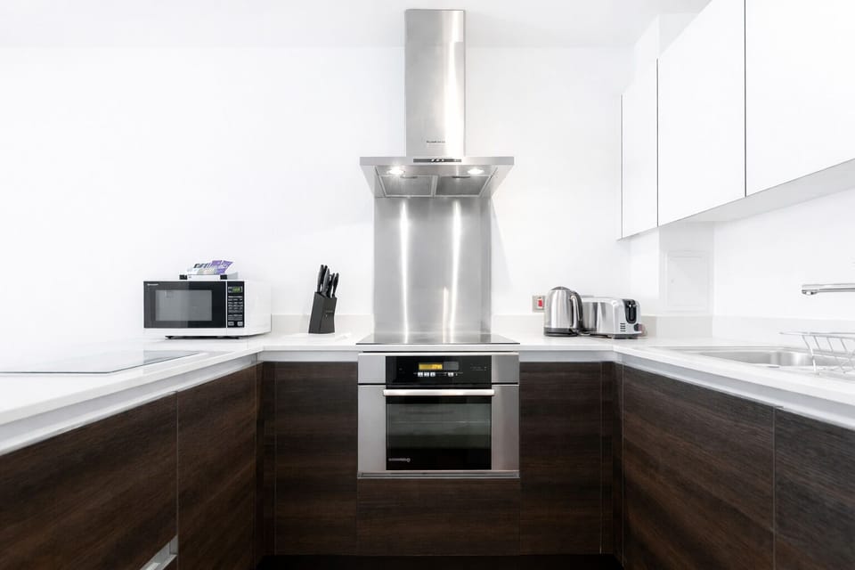 Apartment, 1 King Bed | Private kitchen | Full-size fridge, microwave, oven, stovetop