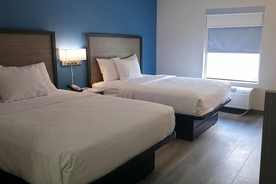 Room, 2 Queen Beds, Non Smoking | In-room safe, desk, blackout drapes, iron/ironing board