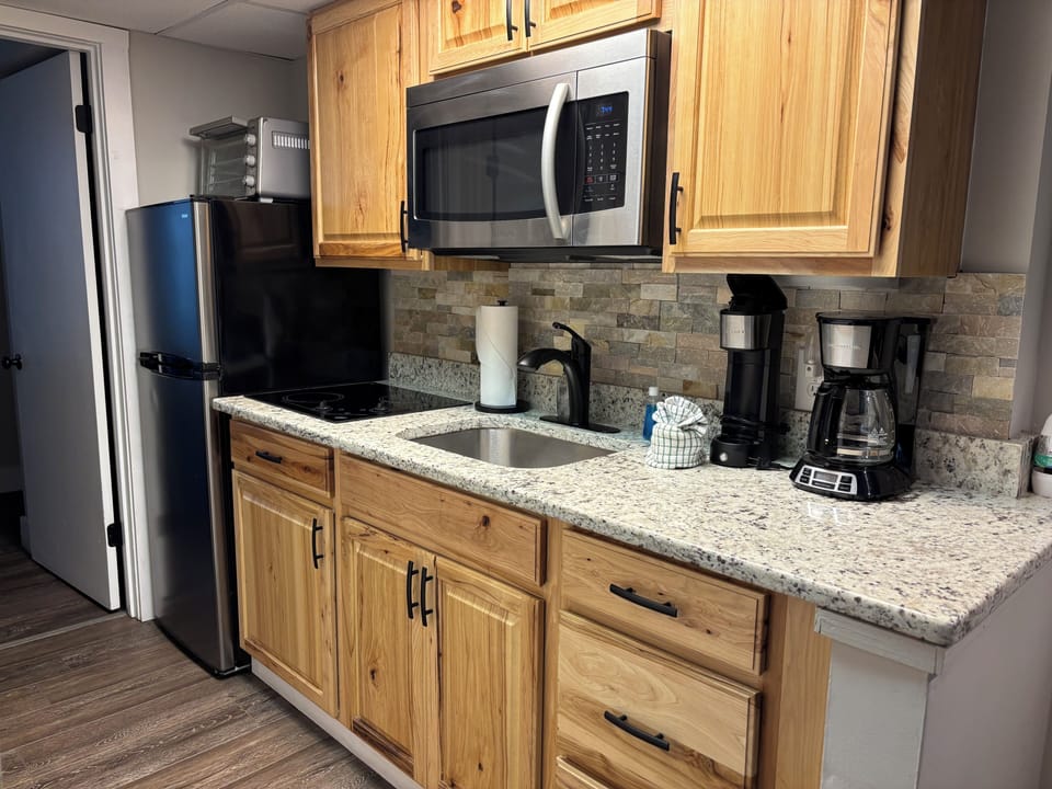 Condo, 1 Bedroom (106) | Private kitchen | Fridge, microwave, stovetop, coffee/tea maker