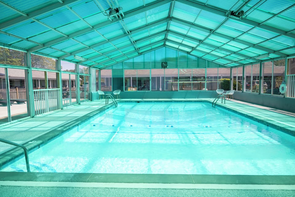 Indoor pool, seasonal outdoor pool, pool umbrellas, sun loungers